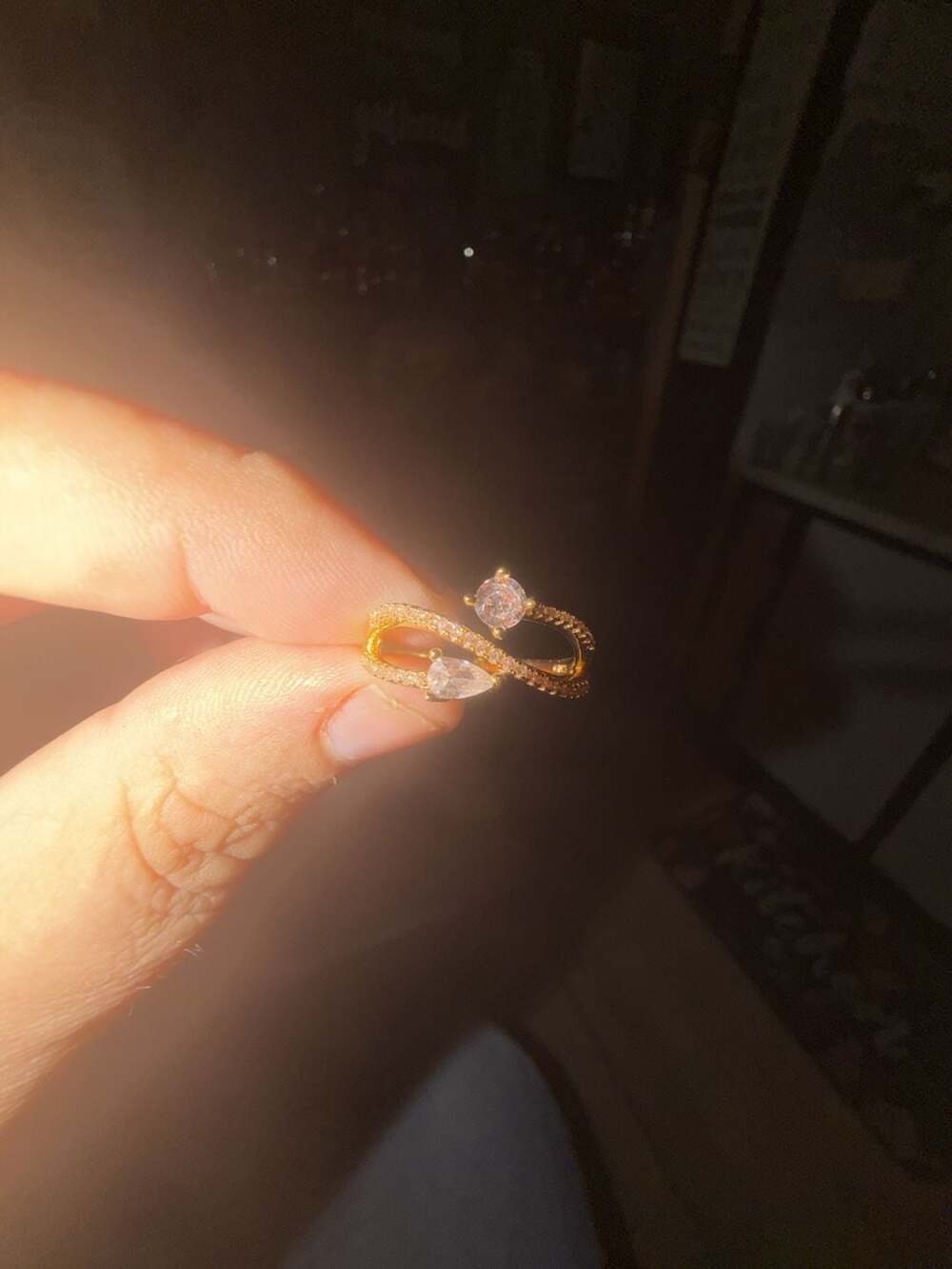 Gold Tone Infinity Style Ring with Pear and Round Cubic Zirconia. Size 8